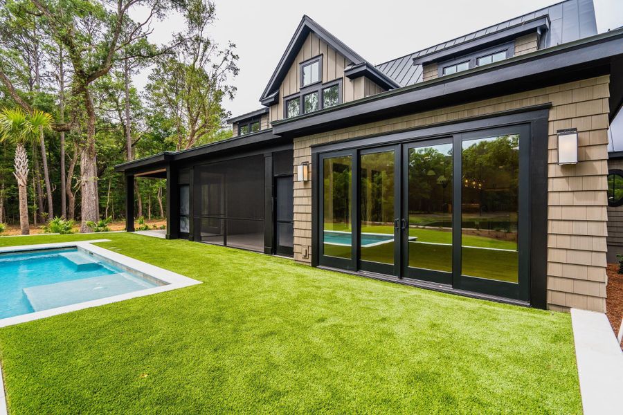 Exterior details and patio area of a home in , Johns Island (Image 40).