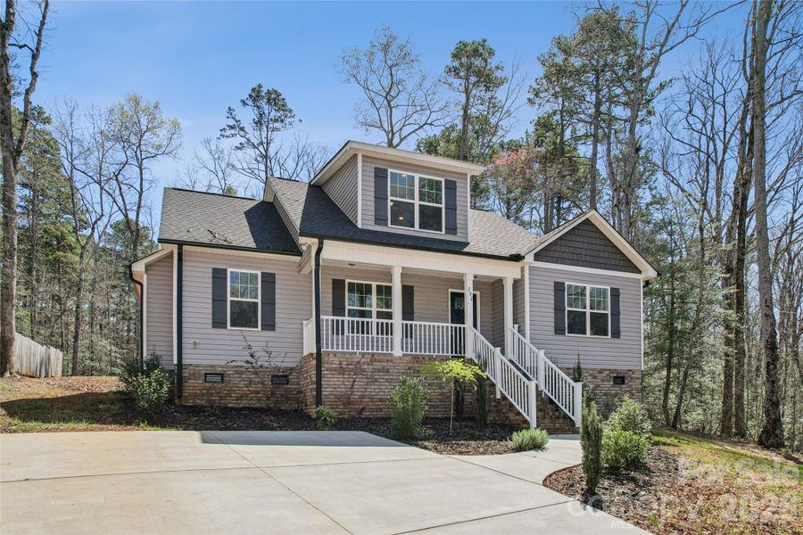 Front exterior of a new home in , Mount Gilead, NC, highlighting curb appeal (Image 21).