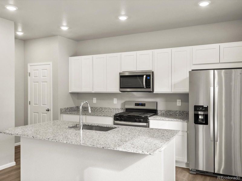 Furnished interior view inside a new home in Lake Bluff, Greeley (Image 6).