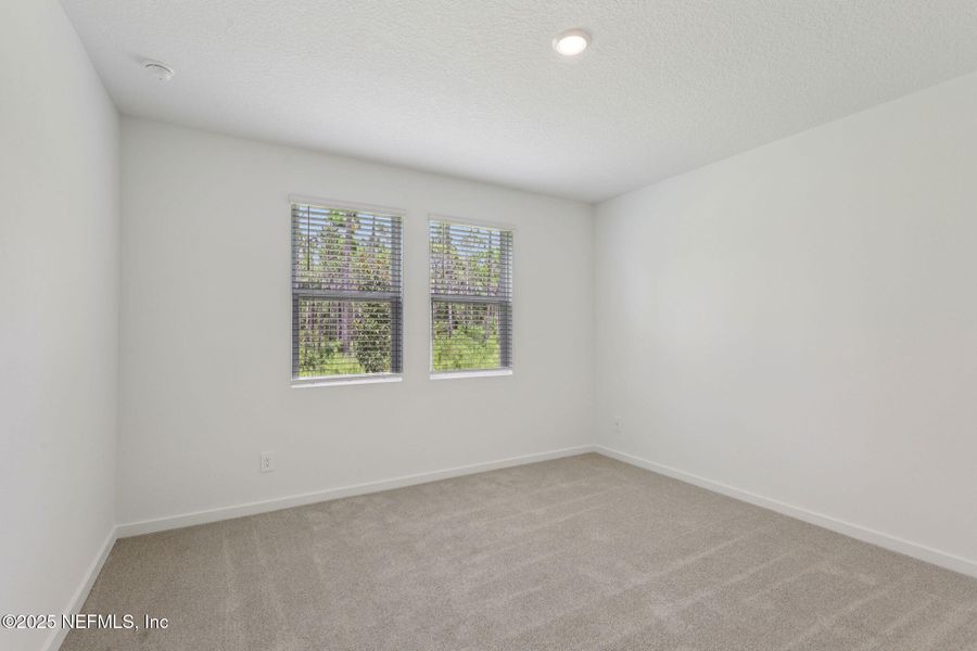 Spacious, unfurnished interior of a new home in Colbert Landings, Palm Coast (Image 26).