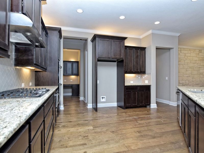 Representative furnished interior of a home built from the Madera II by Giddens Homes in Scofield Farms Estates, Georgetown (Image 259).