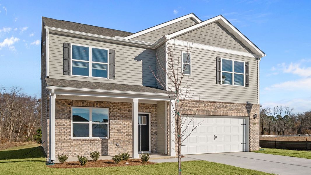 Front exterior of a new home in Villa Grande, Winterville, NC, highlighting curb appeal (Image 21).
