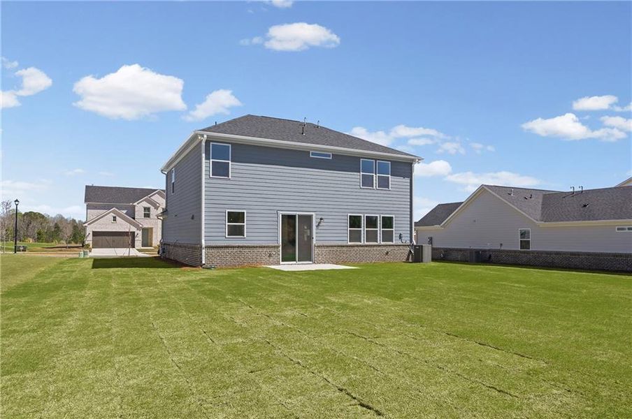 Exterior details and patio area of a home in Overland, Locust Grove (Image 3).