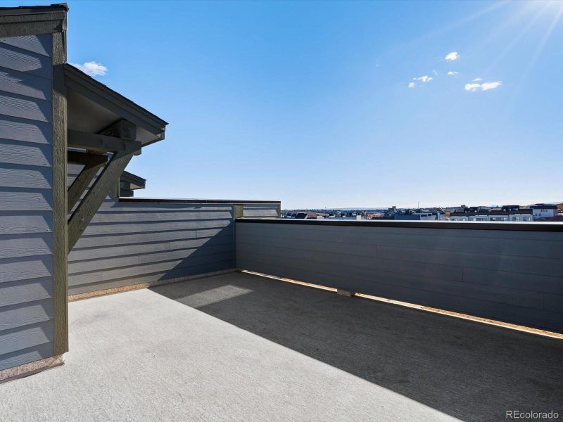 Exterior details and patio area of a home in Three Hills, Morrison (Image 3).