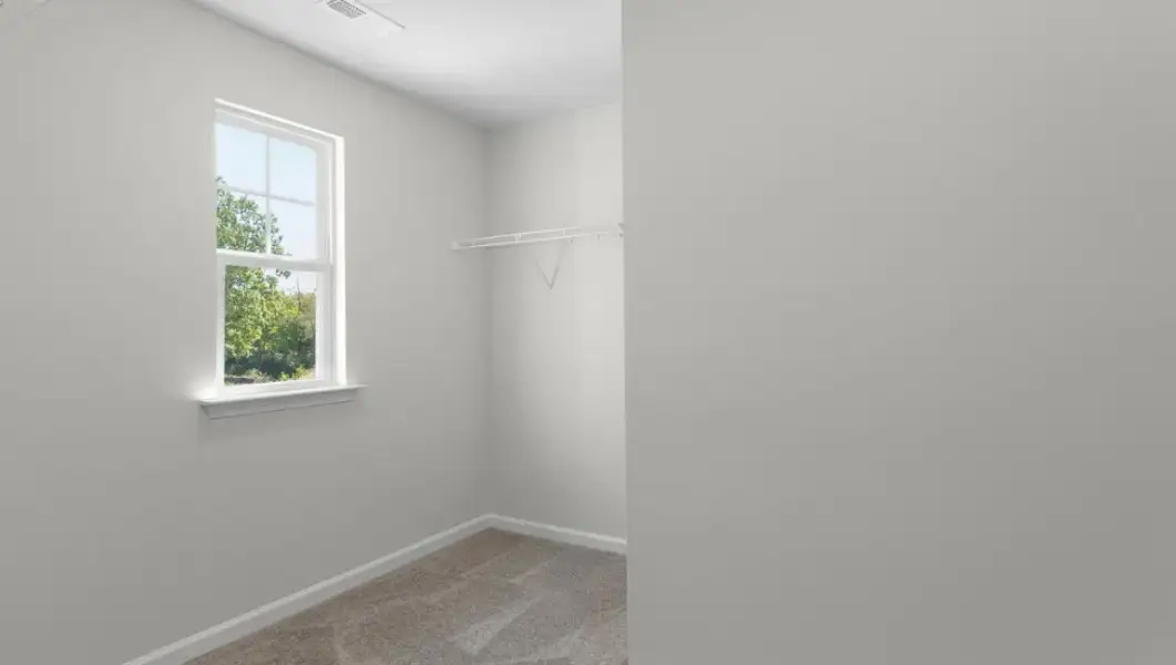 Spacious, unfurnished interior of a new home in The Highlands at Cedar Hill Landing, Navassa (Image 30).