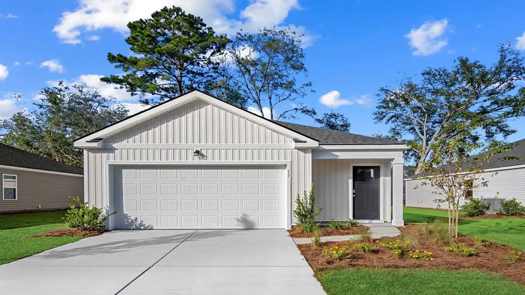 Front exterior of a new home in The Retreat at East Argent, Ridgeland, SC, highlighting curb appeal (Image 1).