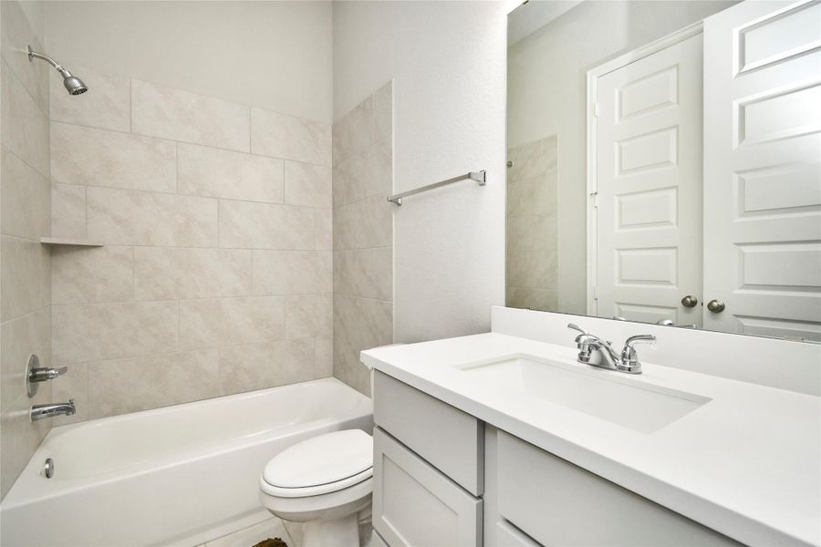 Furnished interior view inside a new home in Cross Creek West 55', Fulshear (Image 8).