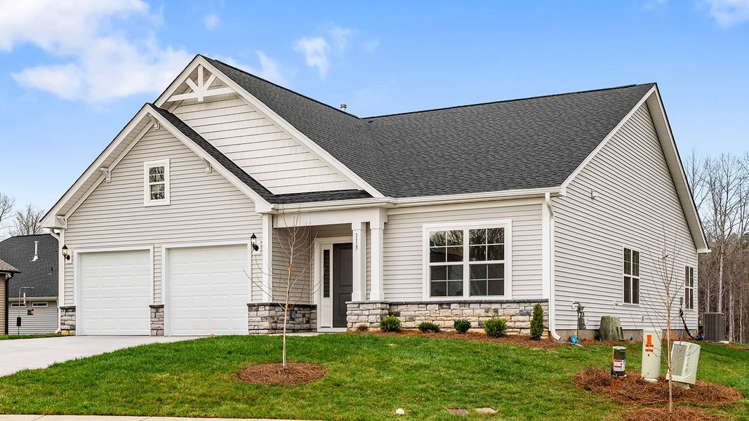 Front exterior of a new home in Brayden, Advance, NC, highlighting curb appeal (Image 16).