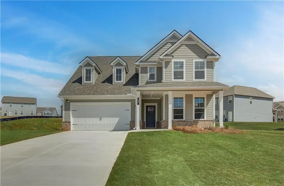 Front exterior of a new home in Chapel Hill, Newnan, GA, highlighting curb appeal (Image 1). Front exterior of a new home in Chapel Hill, Newnan, GA, highlighting curb appeal (Image 1).