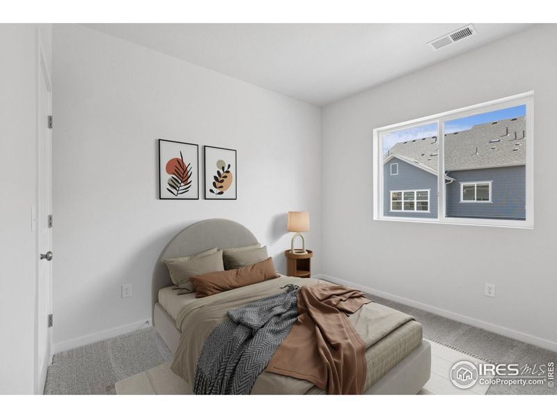 Furnished interior view inside a new home in Kinston Mainstreet Townhomes, Loveland (Image 6). Furnished interior view inside a new home in Kinston Mainstreet Townhomes, Loveland (Image 6).