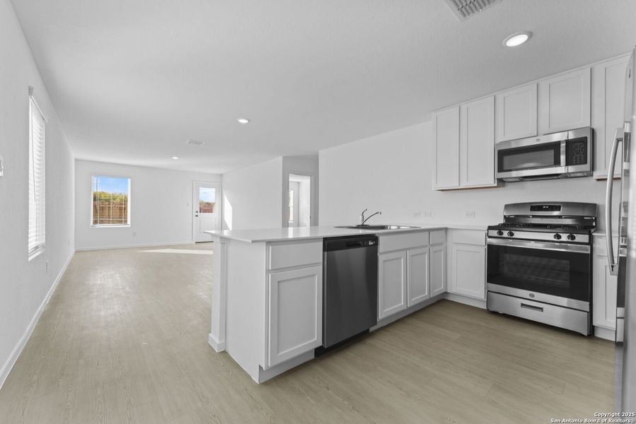 Furnished interior view inside a new home in Torian Village: Belmar Collection, San Antonio (Image 4).