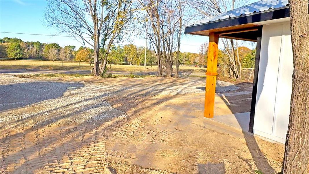 Exterior details and patio area of a home in , Mineola (Image 16).