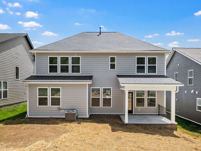Exterior details and patio area of a home in Woods Crossing, Gallatin (Image 29).