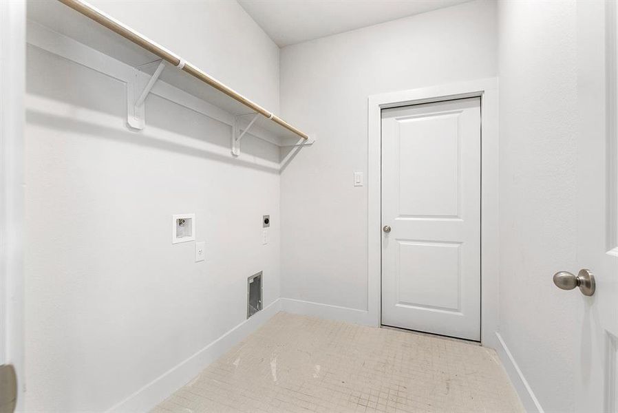 Look at the size of this laundry room!  Leads to 2 car garage.