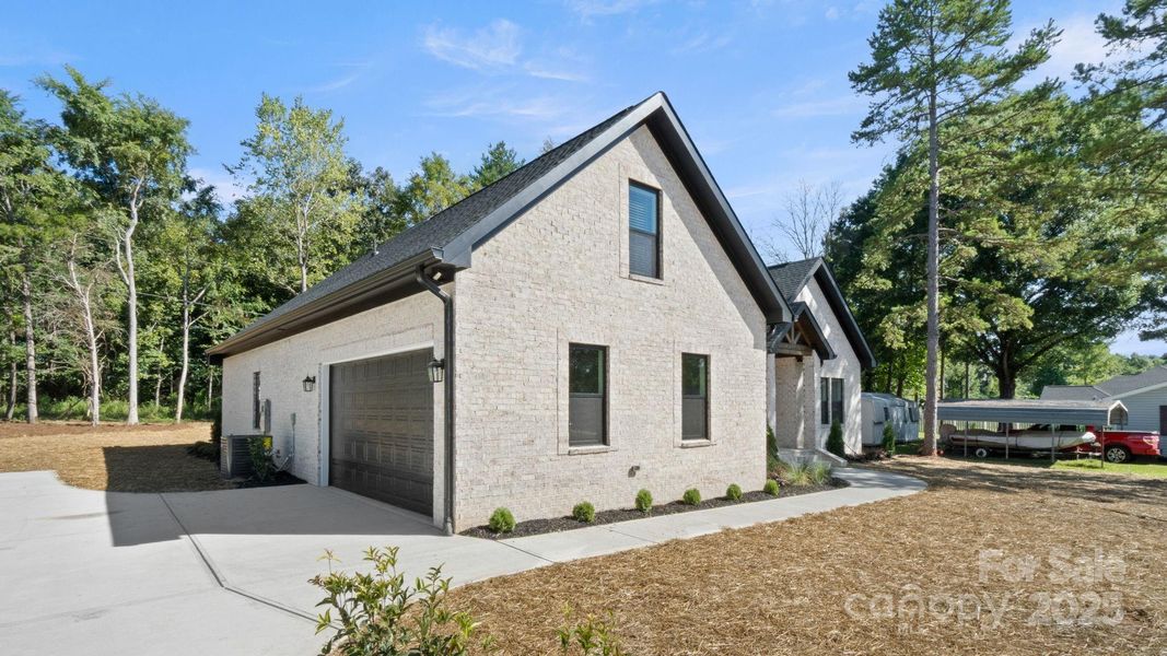 Front exterior of a new home in , Indian Trail, NC, highlighting curb appeal (Image 1). Front exterior of a new home in , Indian Trail, NC, highlighting curb appeal (Image 1).