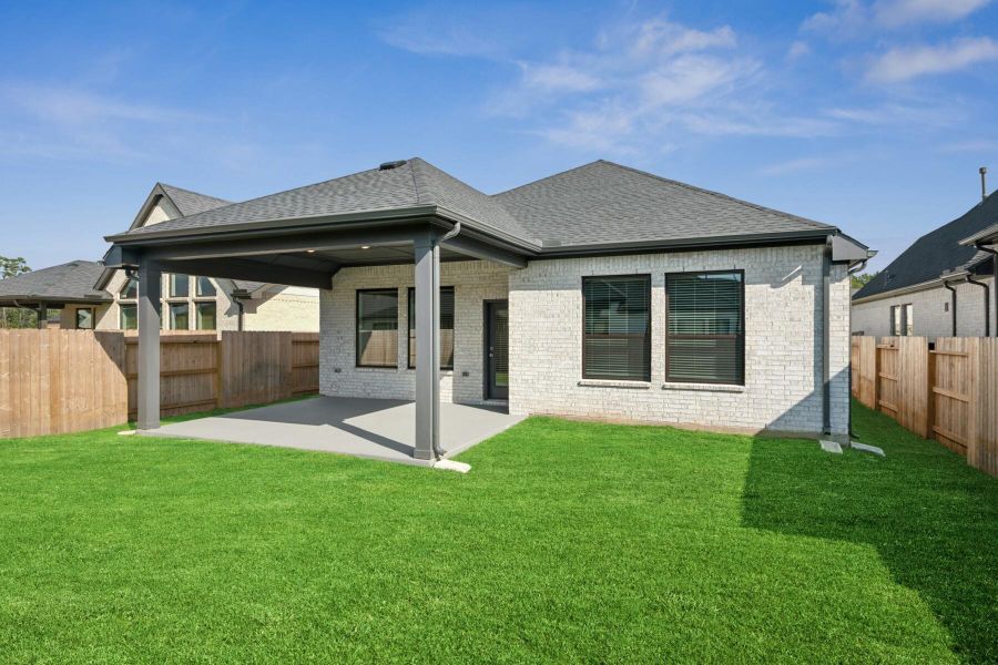 Exterior details and patio area of a home in Audubon 45' Homesites, Magnolia (Image 23).