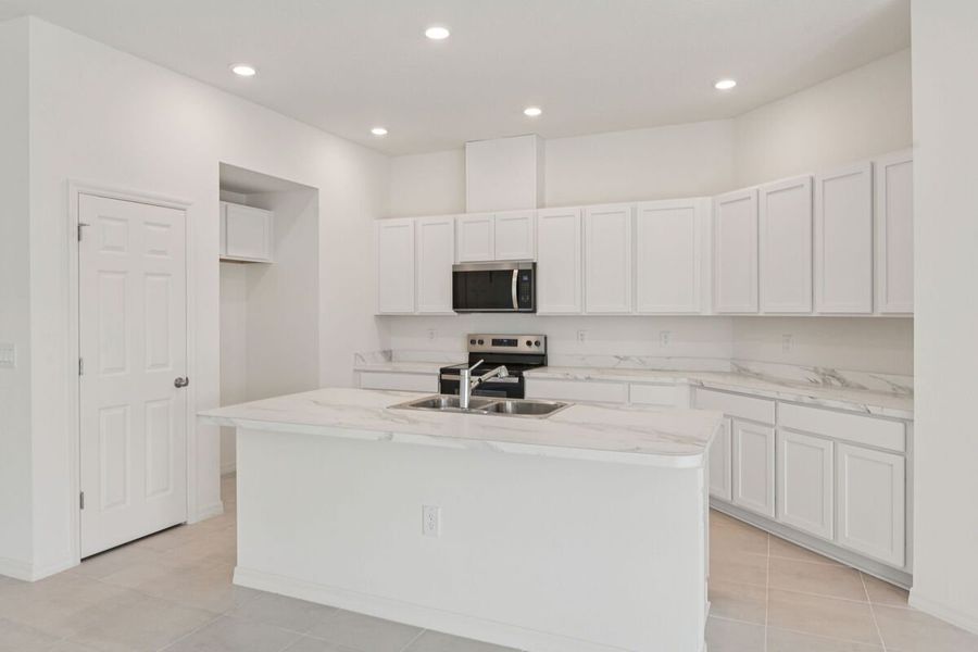 Furnished interior view inside a new home in The Preserve at Legends Pointe II, Hudson (Image 3).