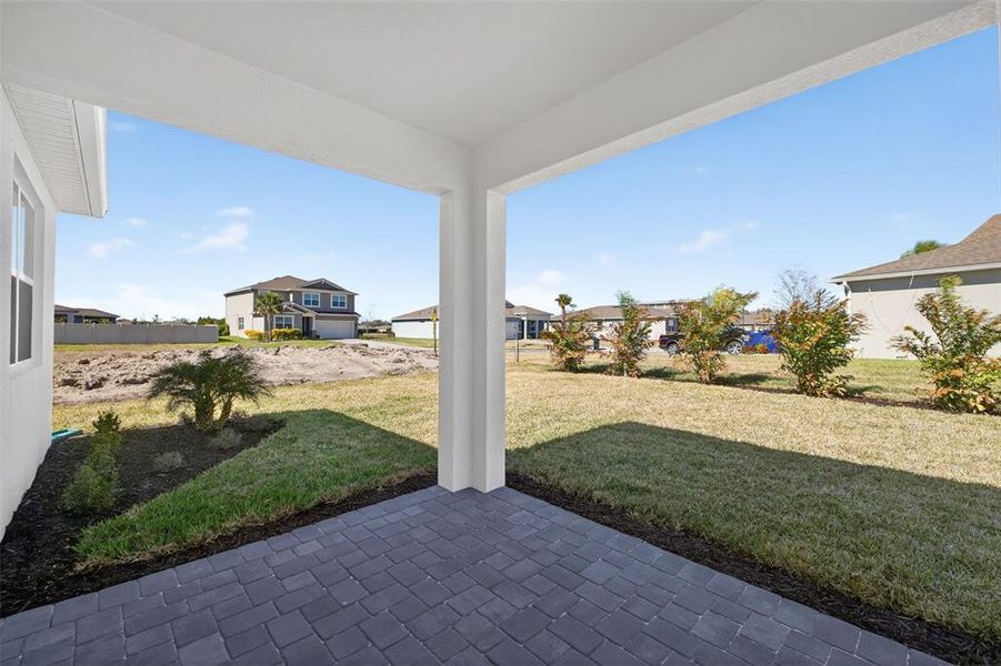 Exterior details and patio area of a home in Windwater, Parrish (Image 11).
