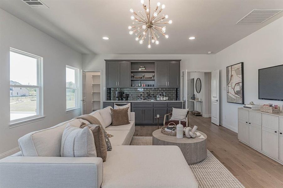 With bar and storage, such a fun football watching space! With bar and storage, such a fun football watching space!