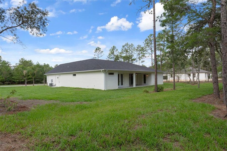 Front exterior of a new home in , Beverly Hills, FL, highlighting curb appeal (Image 26). Front exterior of a new home in , Beverly Hills, FL, highlighting curb appeal (Image 26).