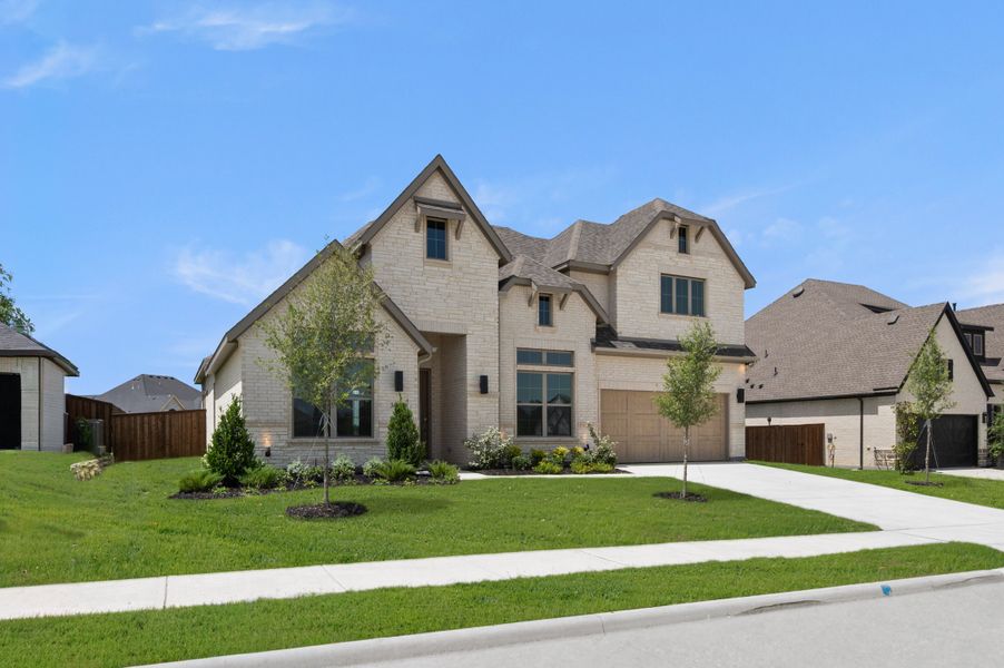 Front exterior of a new home in Redden Farms, Midlothian, TX, highlighting curb appeal (Image 2). Front exterior of a new home in Redden Farms, Midlothian, TX, highlighting curb appeal (Image 2).