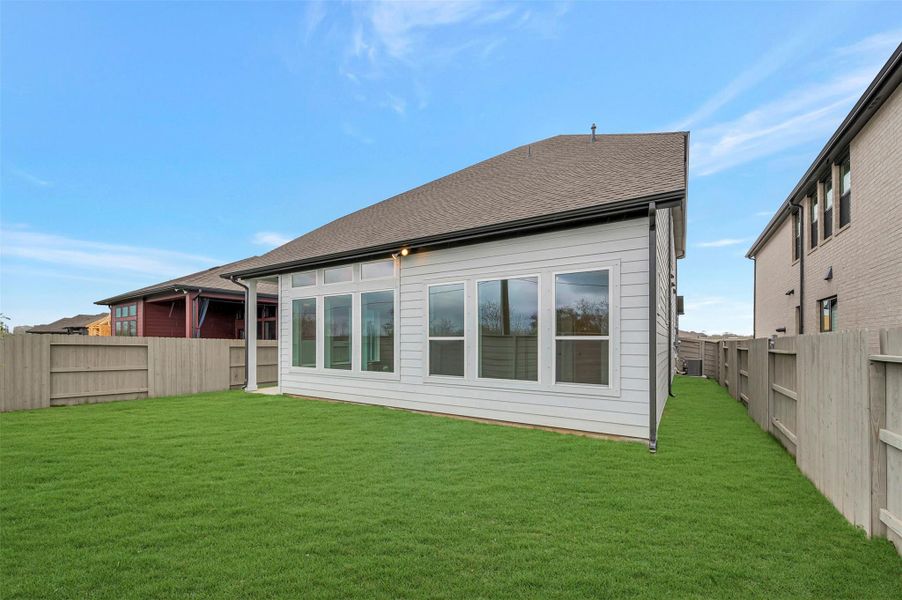 Exterior details and patio area of a home in Pomona - Reserve Collection, Manvel (Image 26).