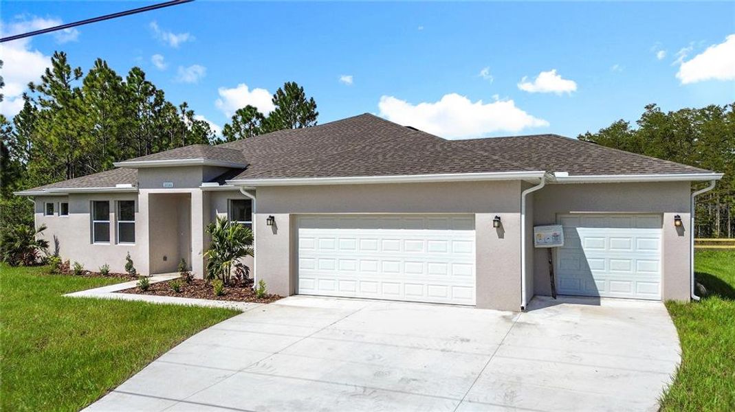 Front exterior of a new home in , Orlando, FL, highlighting curb appeal (Image 1). Front exterior of a new home in , Orlando, FL, highlighting curb appeal (Image 1).