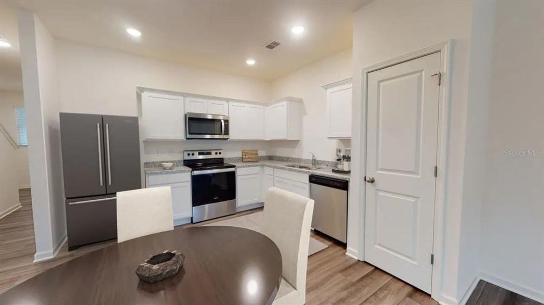 Furnished interior view inside a new home in , Dade City (Image 5).