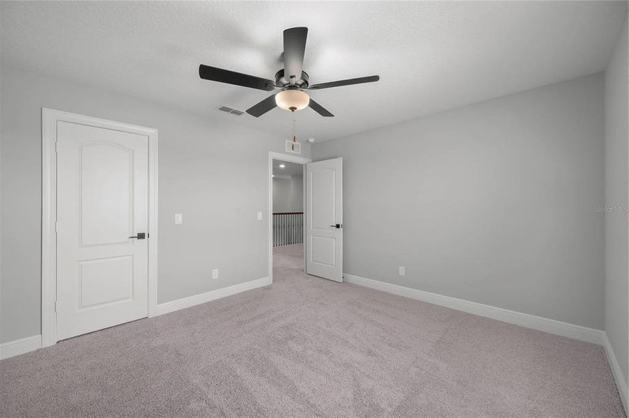 Spacious, unfurnished interior of a new home in Gum Lake Preserve, Lake Alfred (Image 27).