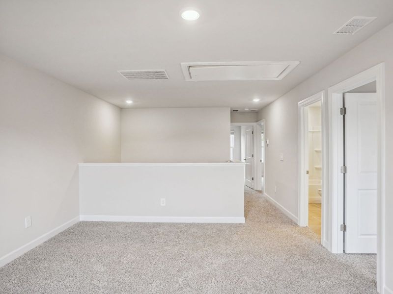 The upstairs loft conveniently leads to all secondary bedrooms.