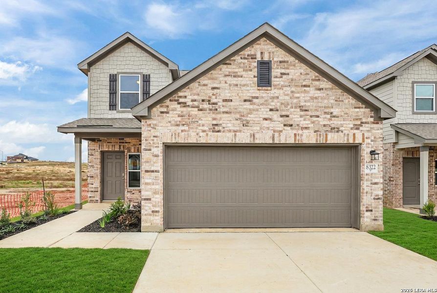 Front exterior of a new home in Garden Grove, San Antonio, TX, highlighting curb appeal (Image 21).