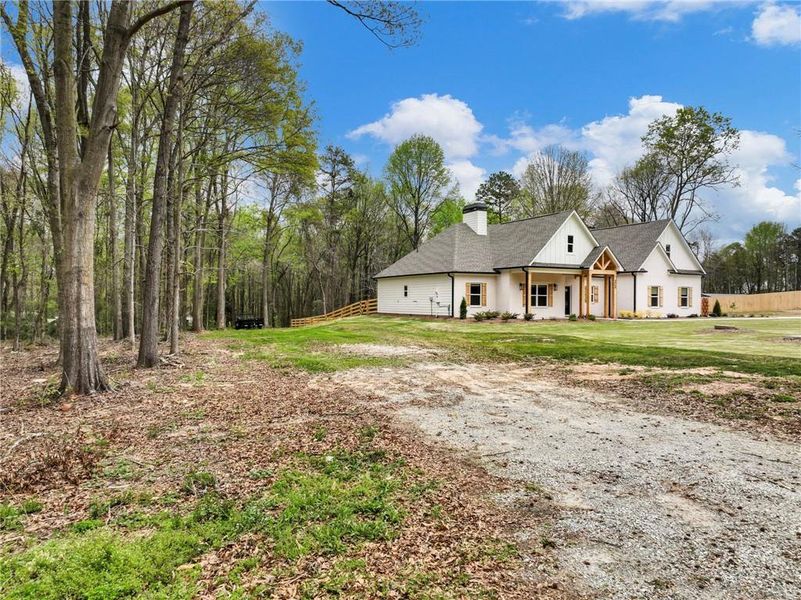 Front exterior of a new home in , Gillsville, GA, highlighting curb appeal (Image 31).