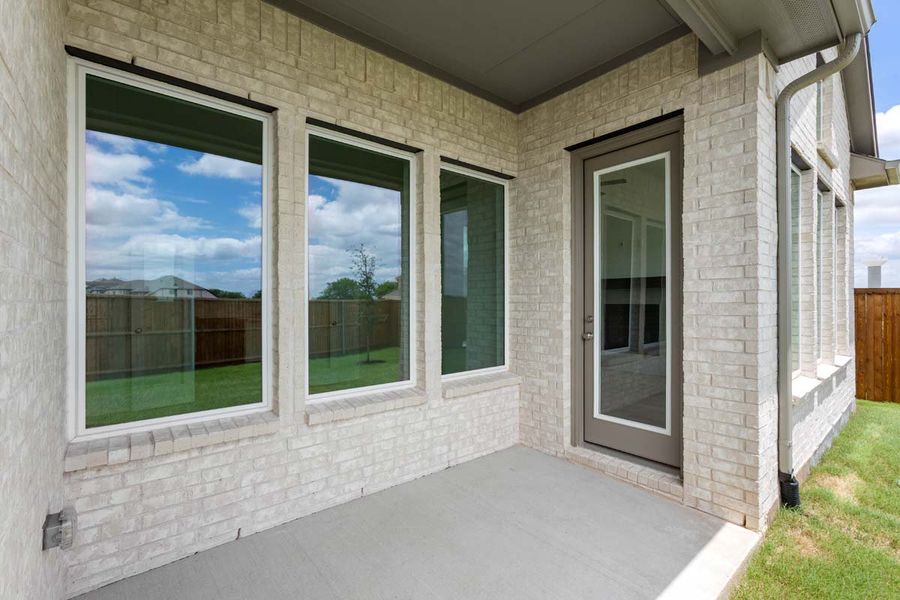 Exterior details and patio area of a home in Timberbrook, Justin (Image 3).