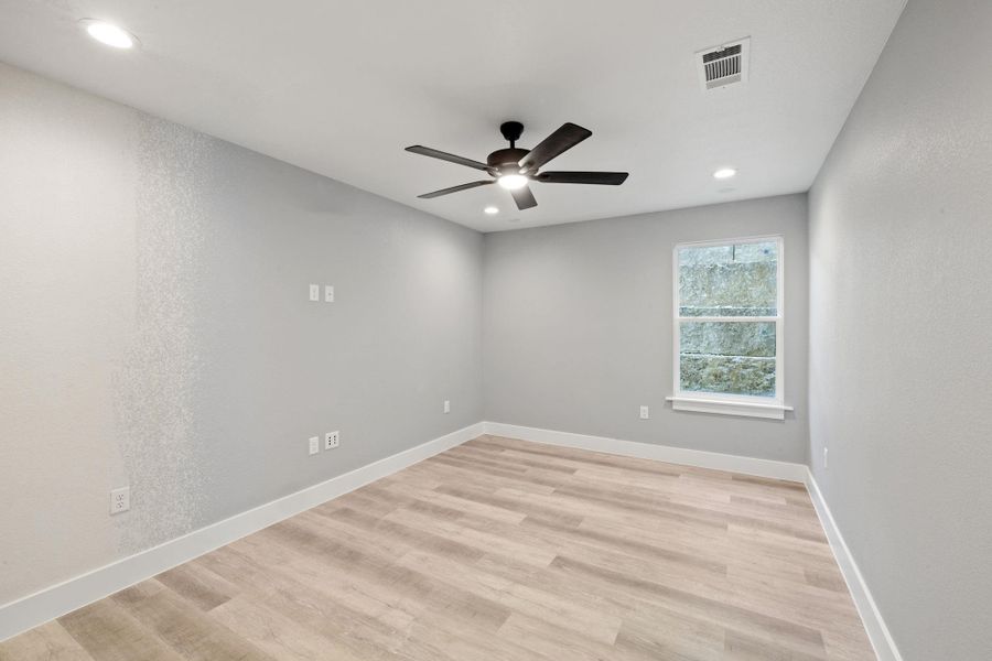 Downstairs bedroom/media room. This room has a walk in closet and is wired for speakers.