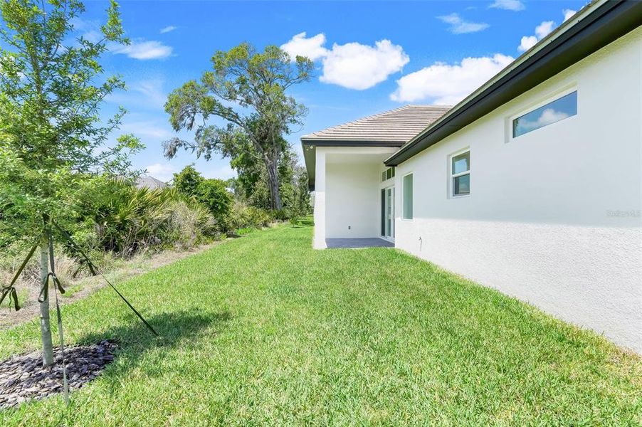 Exterior details and patio area of a home in Toscana, Palm Coast (Image 29).