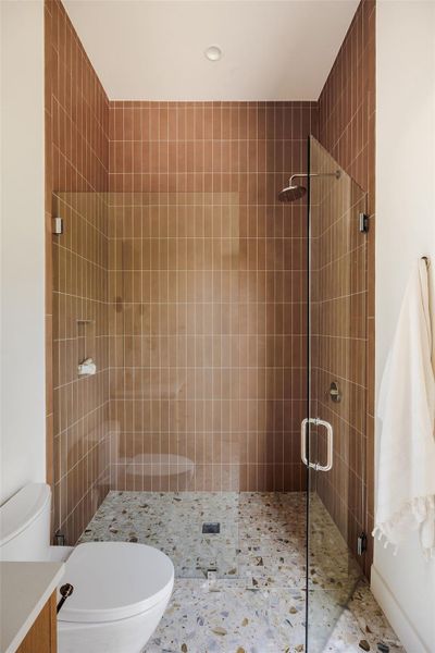 Bathroom with a shower stall and vanity Bathroom with a shower stall and vanity