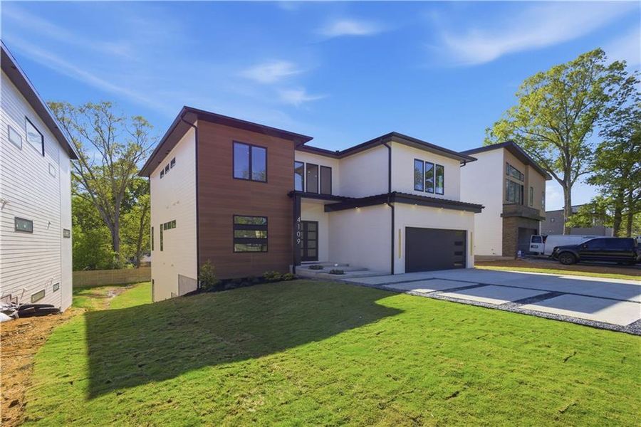 Front exterior of a new home in , Duluth, GA, highlighting curb appeal (Image 29).
