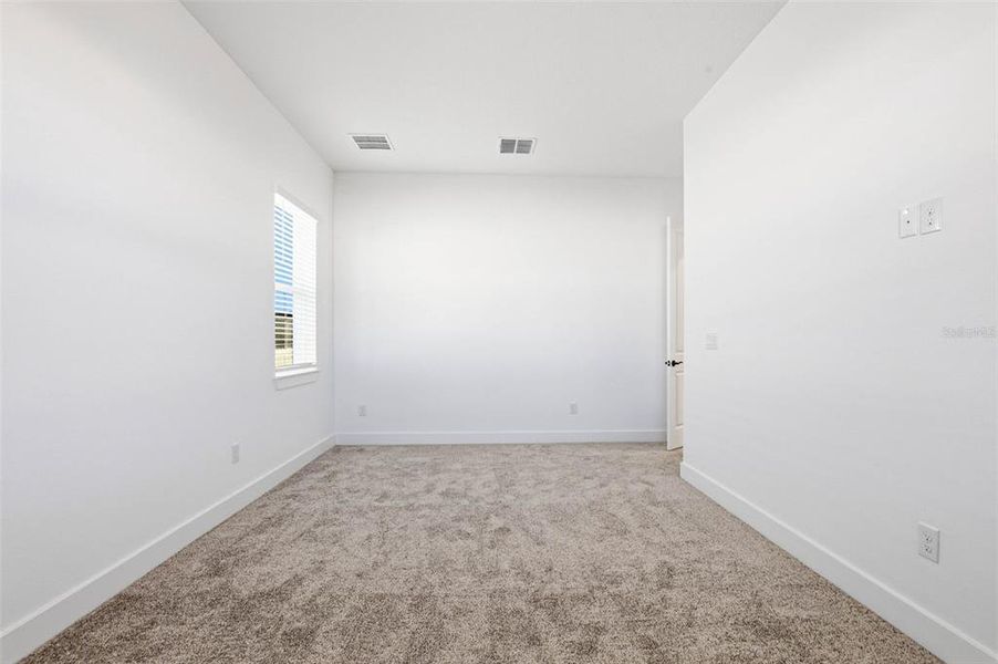 Spacious, unfurnished interior of a new home in Vida's Way, Wesley Chapel (Image 58).
