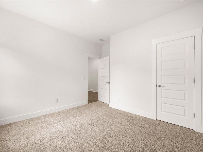 Spacious, unfurnished interior of a new home in The Coves at Lakes of Cane Bay, Summerville (Image 44). Spacious, unfurnished interior of a new home in The Coves at Lakes of Cane Bay, Summerville (Image 44).