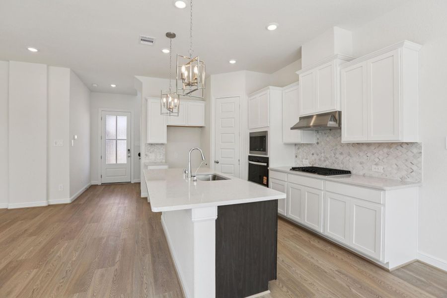 Furnished interior view inside a new home in Kemah Crossing - Luxe Series, Kemah (Image 16). Furnished interior view inside a new home in Kemah Crossing - Luxe Series, Kemah (Image 16).