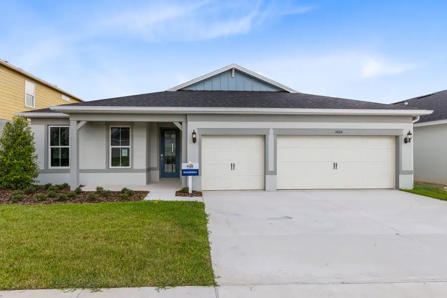 Front exterior of a new home in Hartford Terrace, Davenport, FL, highlighting curb appeal (Image 1). Front exterior of a new home in Hartford Terrace, Davenport, FL, highlighting curb appeal (Image 1).