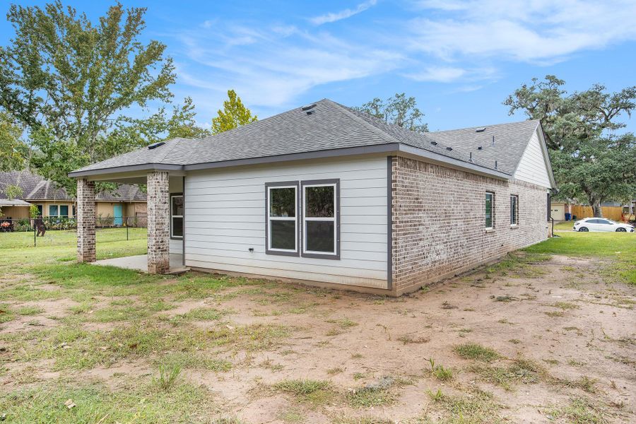 Front exterior of a new home in , Bay City, TX, highlighting curb appeal (Image 25).