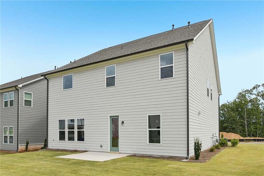Exterior details and patio area of a home in East Harbor II at Chestatee, Dawsonville (Image 21).