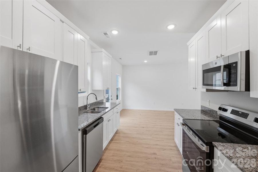 Furnished interior view inside a new home in , Statesville (Image 7).