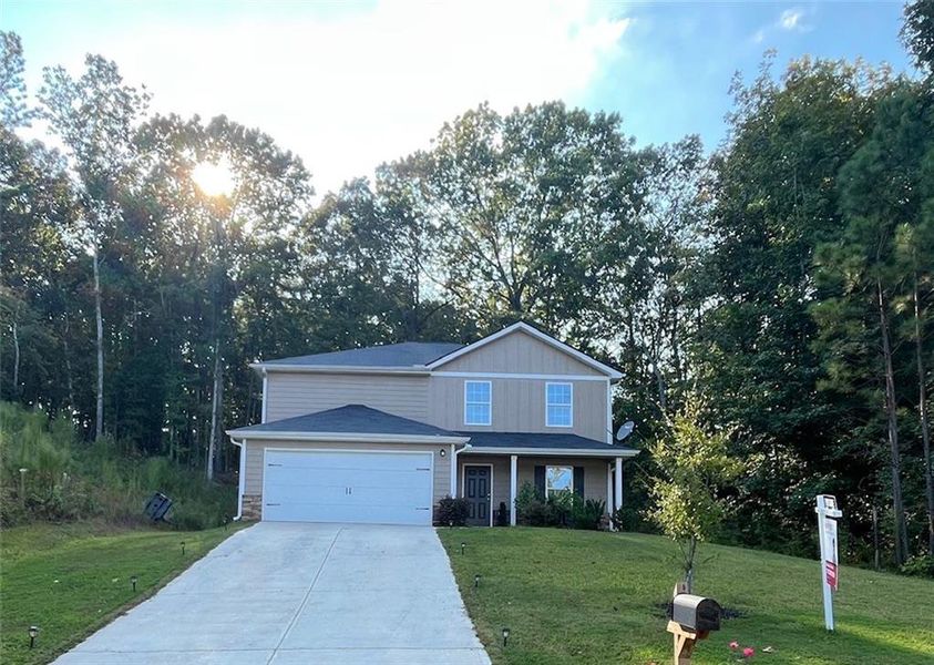 Front exterior of a new home in , Dallas, GA, highlighting curb appeal (Image 19).