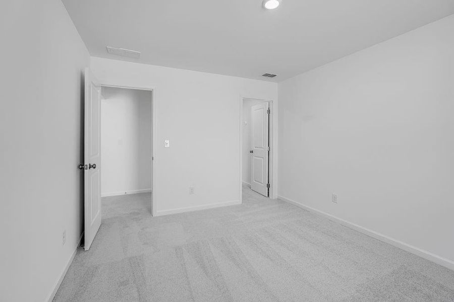 Spacious, unfurnished interior of a new home in Windance Lake, Loganville (Image 36).