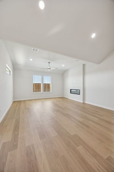 Living Room in the Wimbledon home plan by Trophy Signature Homes – REPRESENTATIVE PHOTO