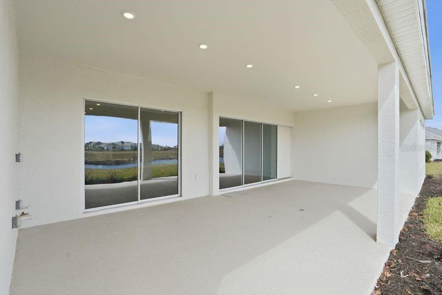 Exterior details and patio area of a home in Coasterra Community Group Page, Palmetto (Image 22).