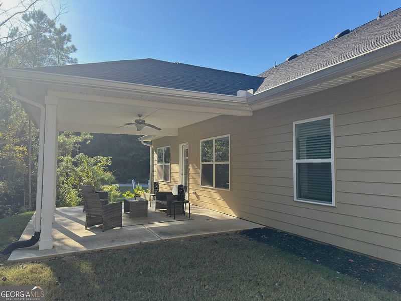 Exterior details and patio area of a home in Carson's Walk, Macon (Image 16).