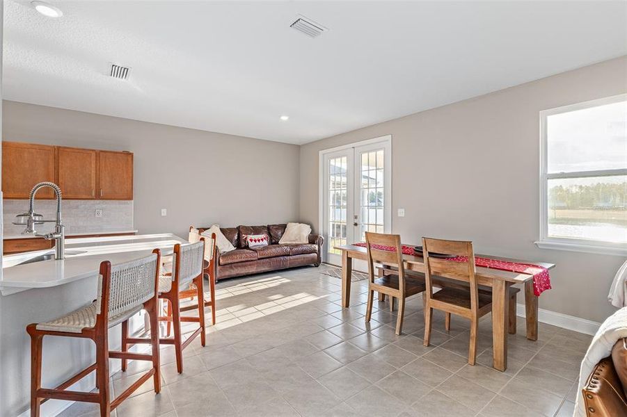 Furnished interior view inside a new home in Somerset - Classic Series, Palm Coast (Image 13).